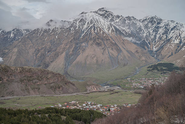 istock Snow-capped mountains Kazbek at dawn, Georgia 498343950