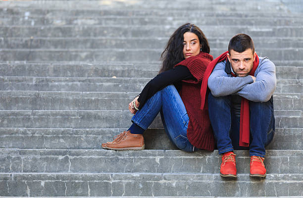 istock Relationship troubles coming on the stairs 498344600