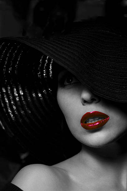 istock Mysterious woman in black hat. Red lips 498359749