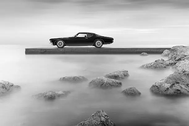 '72 Buick Riviera standing on pier.