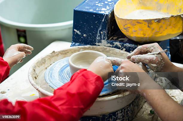 Teaching Pottery Stock Photo - Download Image Now - Child, Pottery, 30-39 Years