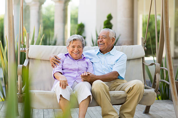 istock Senior couple laughing together 498366301