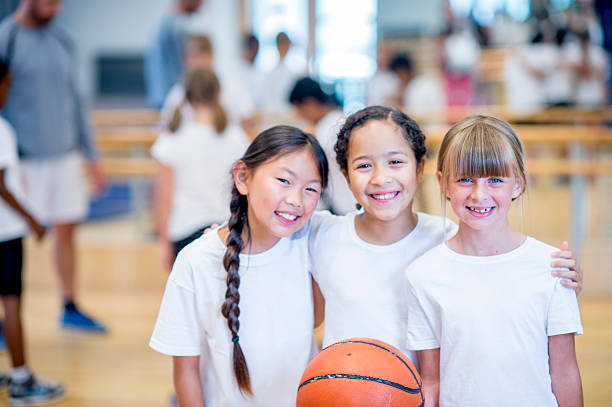 istock Girls Playing Basketball 498367270