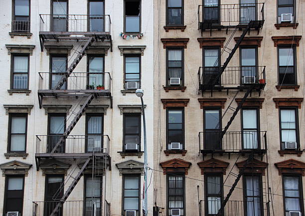 istock Outdoor Fire Escapes on Two Contrast American Buildings 498367304