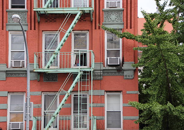 istock Green Metal Fire Escapes on Old Red Building 498367410