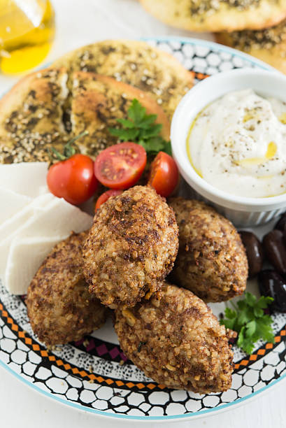 istock Kibbeh - arabic crocquette made with minced meat and bulgur 498368614