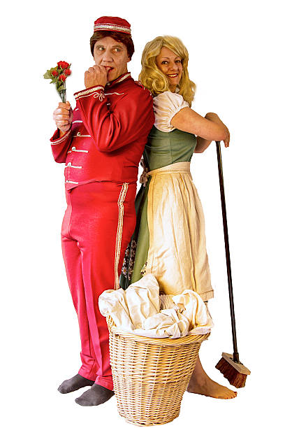 madura pareja en traje standing back to back " - teatro de pantomima británico fotografías e imágenes de stock