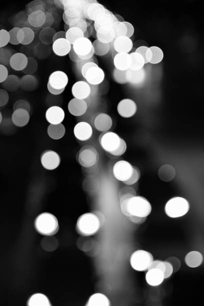istock blured bokeh light in city in black and white tone 498369892