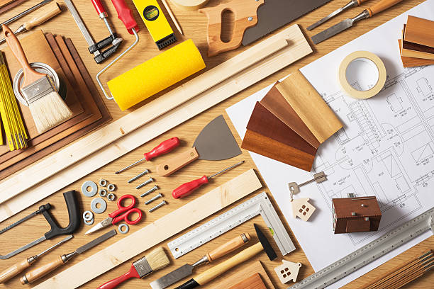 Do it yourself home improvement Do it yourself home improvement and renovation concept, work table top view with work tools and draft project, top view blueprint industry work tool planning stock pictures, royalty-free photos & images