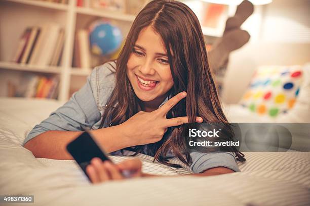 Teenage Girl Taking Selfie Stock Photo - Download Image Now - 12-13 Years, 14-15 Years, 2015