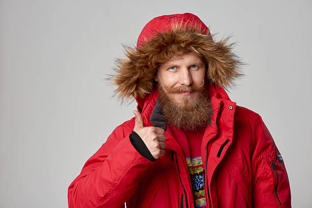 istock bright picture of handsome man in winter jacket 498375162