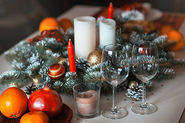 istock Christmas decoration with candles and glasses 498376962