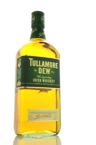 Kwidzyn, Poland - April 9, 2015: Tullamore Dew whiskey isolated on white background. Tullamore Dew is blended Irish whiskey produced by William Grant and Sons since 1829