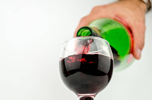 istock pouring wine in a glass,soft focus 498379084