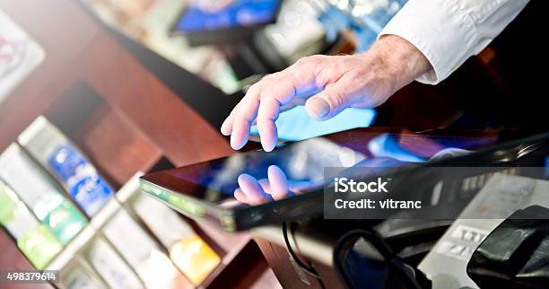 Bartender At The Point Of Sale Terminal Stock Photo - Download Image Now - Cash Register, Aiming, Computer Monitor