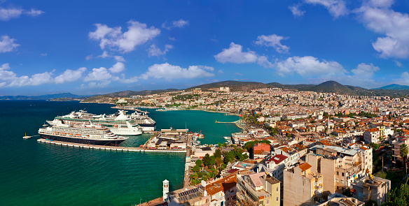 Kusadasi, Aydin, Turkey - October 24, 2015: Cruise ship at the Kusadasi Port. Kusadasi which is a resort town on Turkey's Aegean coast. Most of the people will visit the Ephesus ruins, Mary Home and Selcuk province during the day.