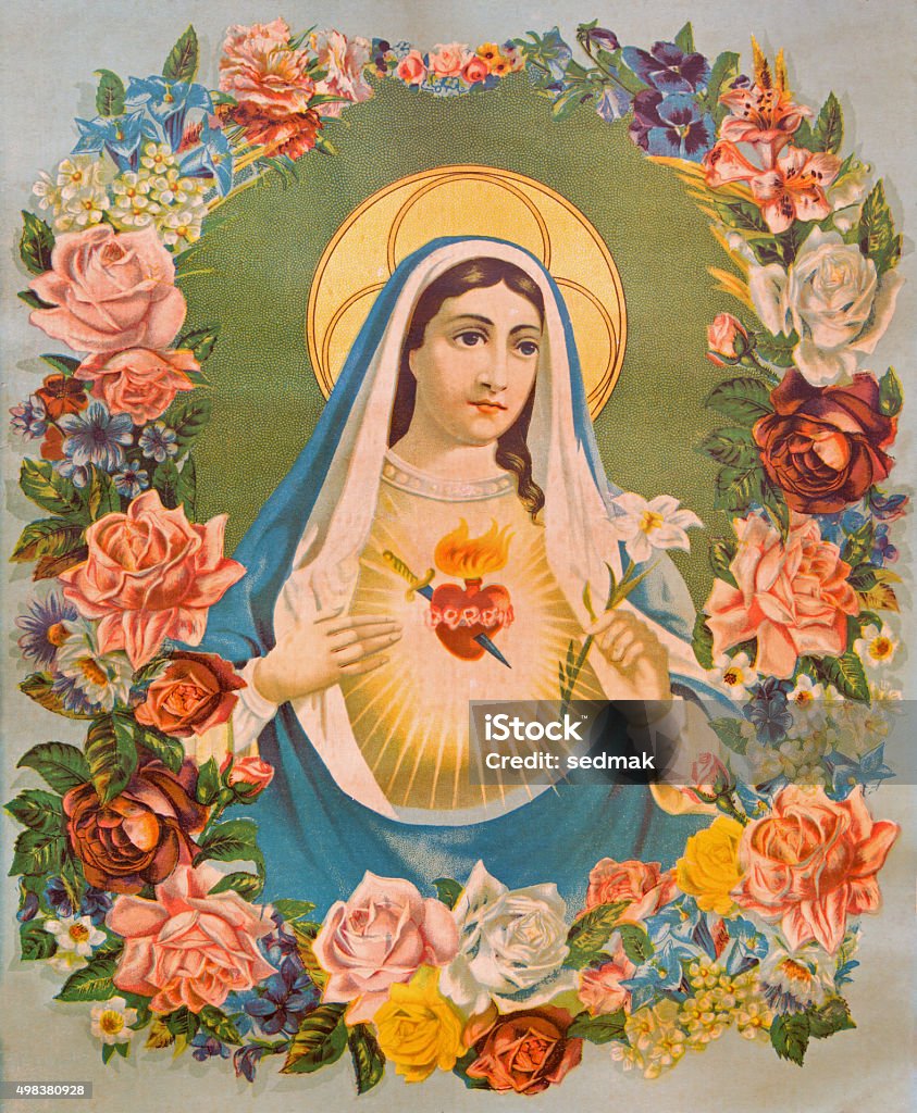 The Heart of Virgin Mary in the flowers. The Heart of Virgin Mary in the flowers. Typical traditional catholic image printed in Germany in end of 19. cent. originally designed by unknown painter and taken in village Sebechleby in Slovakia. Virgin Mary Stock Photo