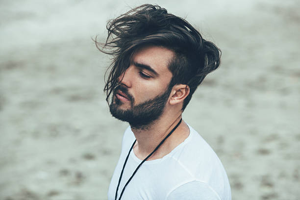 istock Portrait of a man with beard and modern hairstyle 498381062