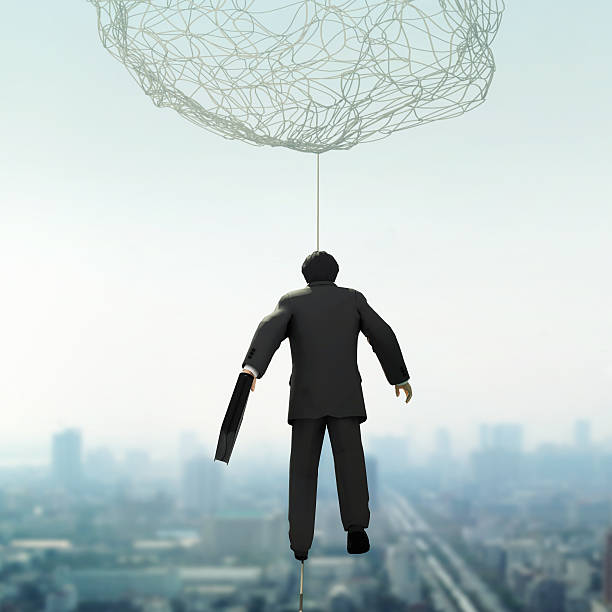 istock Businessman walking on Tightrope 498385771