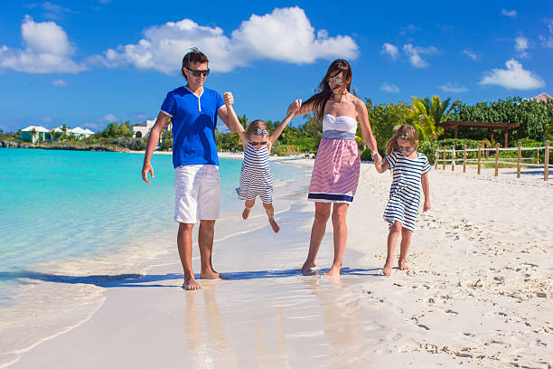 istock Happy family with two kids on summer vacation 498387523