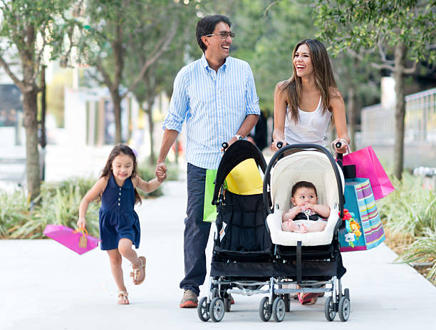 Family out shopping Family out shopping looking very happy mall walker stock pictures, royalty-free photos & images