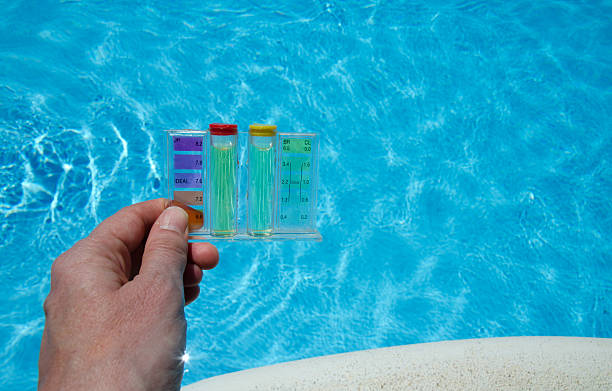 Swimming pool water testing stock photo