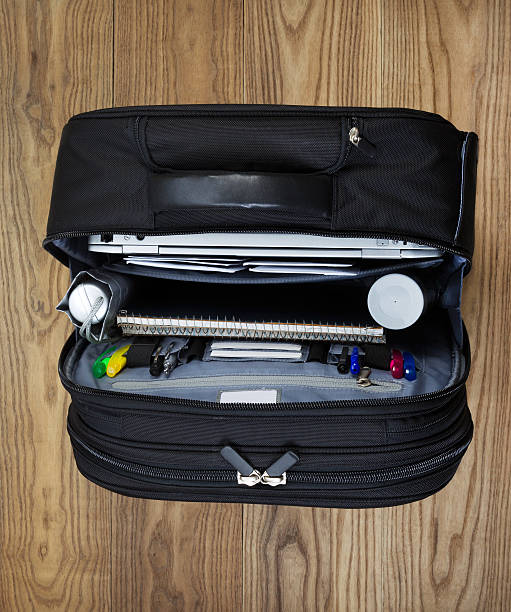 istock Open Office Travel Bag on Floor 498389769