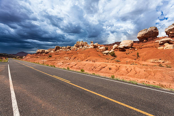 istock Desert Road and Stormy clouds, USA 498392167