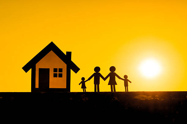 istock Paper cut of family silhouette 498396018