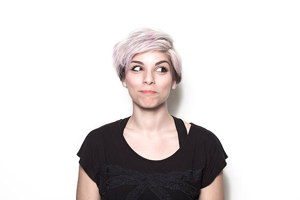 istock Sly girl looking aside 498397179