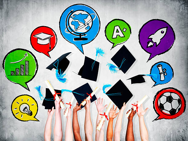 istock Multiethnic Group of Arms Raised and Graduation Concepts 498397589