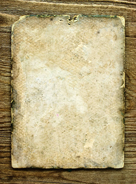 istock old paper on brown wood texture with natural patterns 498397705