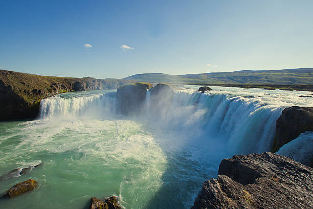 Beautiful vibrant panorama picture with view on waterfall in iceland Beautiful vibrant landscape picture of famous Icelandic Waterfall in Iceland hraunfossar stock pictures, royalty-free photos & images