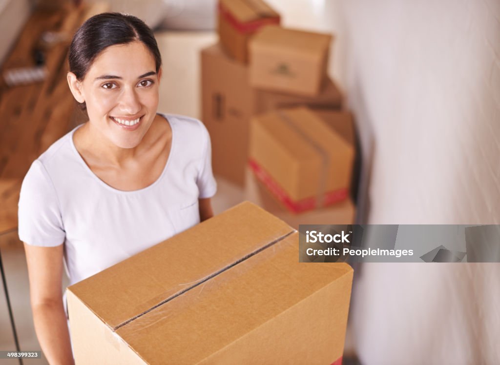 Ready to start unpacking A young woman surrounded by boxeshttp://195.154.178.81/DATA/i_collage/pi/shoots/783408.jpg 20-29 Years Stock Photo