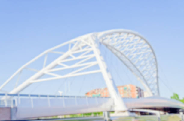 Defocuses background of Garbatella Bridge in Ostiense district, Rome, Italy. Intentionally blurred post production for bokeh effect
