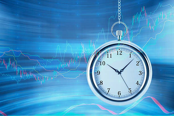 istock pocket watch are hovering in the air over financial graphs 498399842