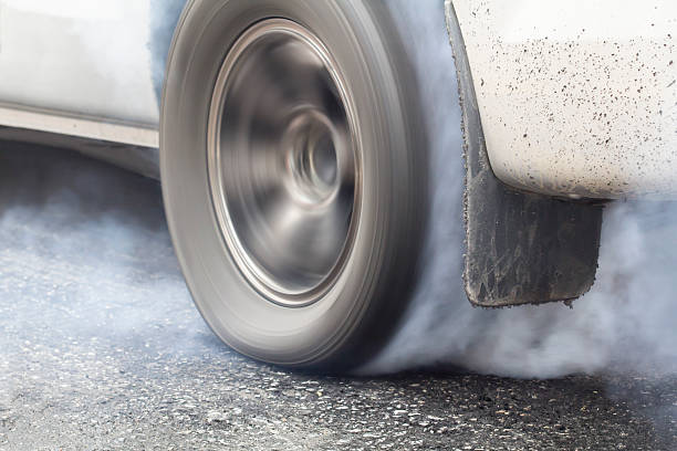 istock race car burns tires 498399844