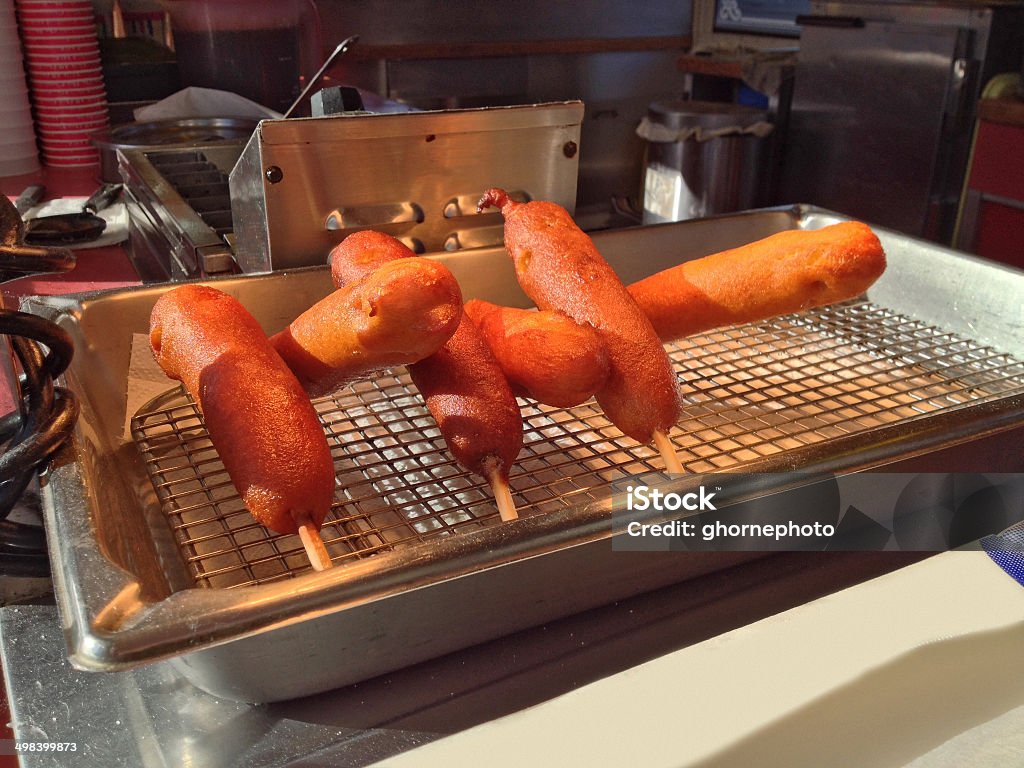 Corn Dogs Corn Dogs ready to be sold at a local carnival by food vendor Corn Dog Stock Photo