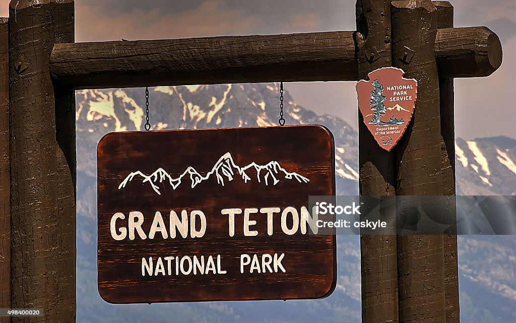 Entrance Sign, Grand Teton National Park, Jackson Hole, Wyoming, USA Grand Teton National Park is in the northwest of the U.S state of Wyoming. It encompasses the Teton mountain range, the 4000-meter Grand Teton peak, and the valley known as Jackson Hole. It’s a popular destination for mountaineering, hiking, backcountry camping and fishing, linked to nearby Yellowstone National Park by the John D. Rockefeller, Jr. Memorial Parkway 2015 Stock Photo