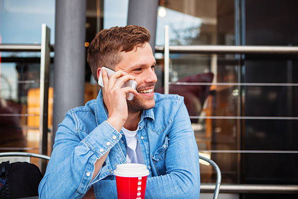 istock Young adult talking on the phone 498401098