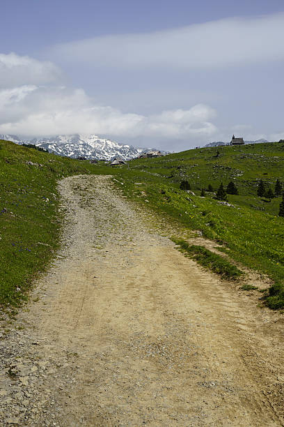 istock Mountain sight with old wooden church 498401113
