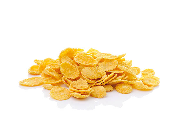 istock Sweet, tasty cornflakes, dry crispy on white background 498401317