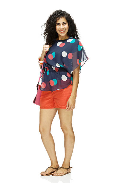 Happy young woman standing