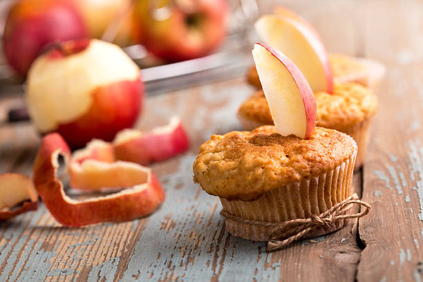 delicious homemade muffins with apples stock photo