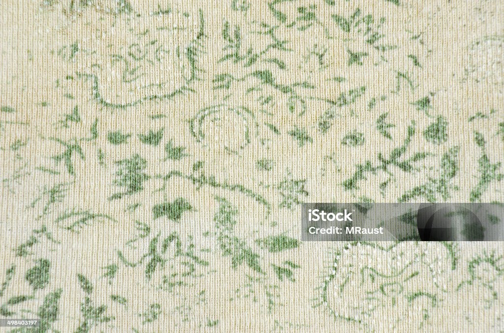 Green Leaf Printed Knit A close up of green floral printed fabric Art And Craft Stock Photo