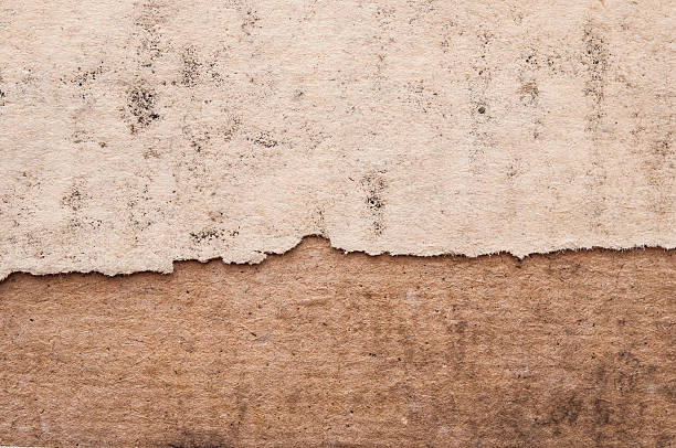 istock Very old grunge paper background or texture 498403640