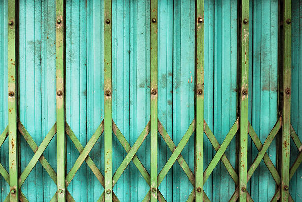 istock Old Metal Folding Door  with rusty and scratches close up 498404393