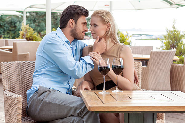 istock Affectionate young couple spending quality time at outdoor restaurant 498405081