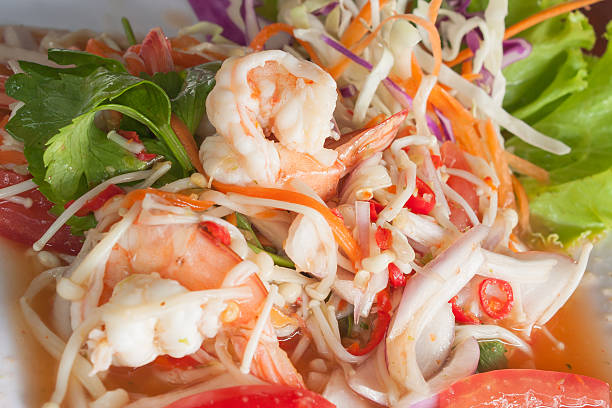 istock Fresh shrimp papaya salad  with mushrooms 498406218
