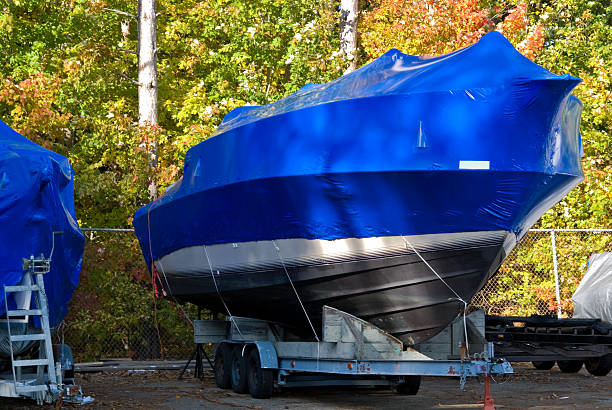 istock blue tarpaulin on power boat 498408206
